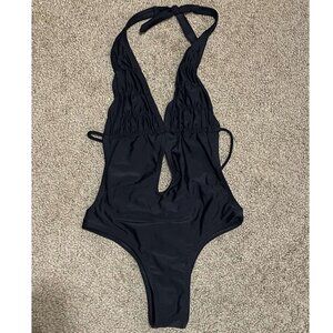 black one-piece Brazilian swimsuit
